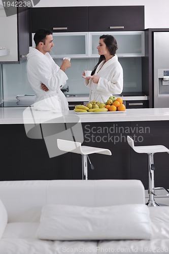 Image of young couple have fun in modern kitchen