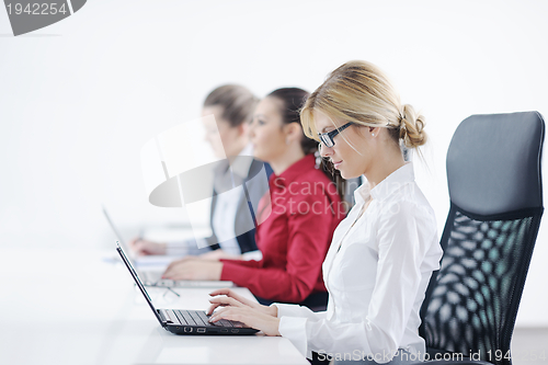 Image of business woman group with headphones