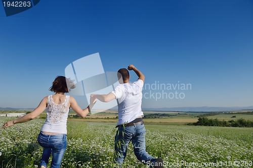 Image of happy couple in wheat field