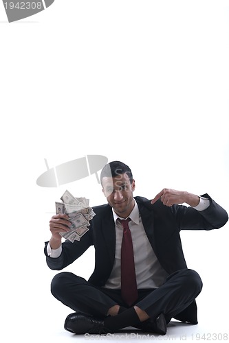 Image of Business man holding money