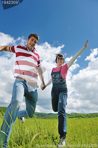 Image of romantic young couple in love together outdoor