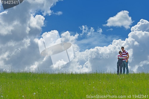 Image of romantic young couple in love together outdoor