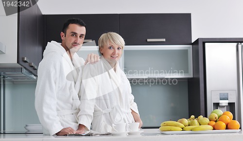 Image of young couple have fun in modern kitchen