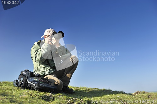 Image of Nature photographer with digital camera
