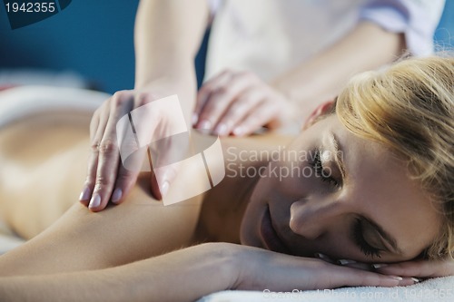 Image of Beautiful young woman in spa