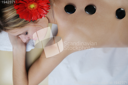 Image of Beautiful young woman in spa