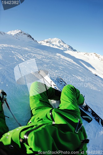 Image of skiing on fresh snow at winter season at beautiful sunny day