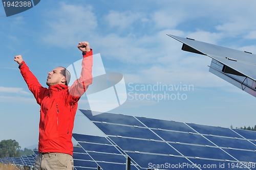 Image of Male solar panel engineer at work place