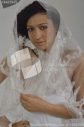 Image of Portrait of a beautiful woman dressed as a bride