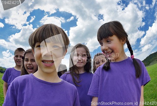 Image of happy kids group  have fun in nature