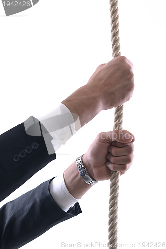 Image of business man with rope isolated on white background