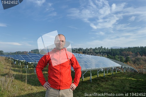 Image of Male solar panel engineer at work place