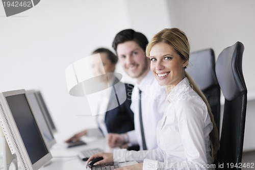 Image of business people group working in customer and help desk office