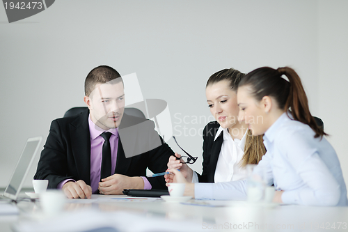 Image of Group of young business people at meeting