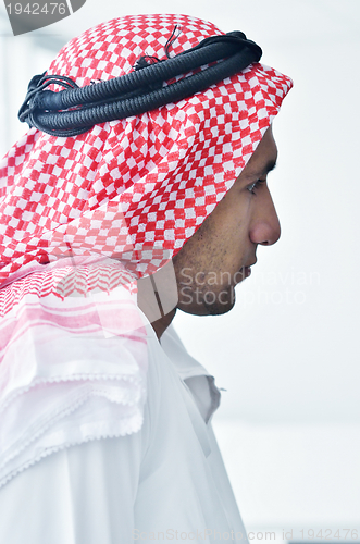 Image of arab business man at bright office