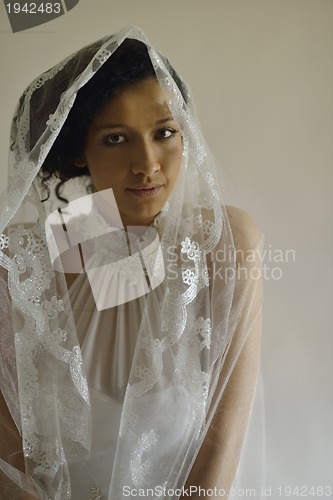 Image of Portrait of a beautiful woman dressed as a bride