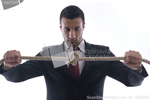 Image of business man with rope isolated on white background