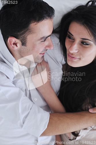 Image of happy young couple relax at home