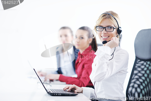 Image of business woman group with headphones