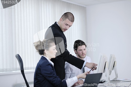 Image of business people group working in customer and help desk office