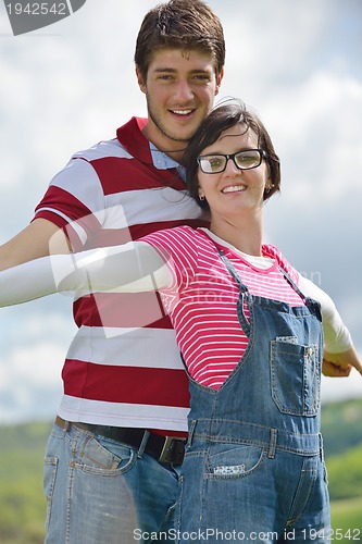 Image of romantic young couple in love together outdoor