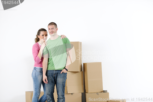 Image of Young couple moving in new house