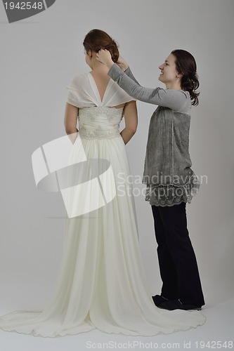 Image of portrait of a three beautiful woman in wedding dress