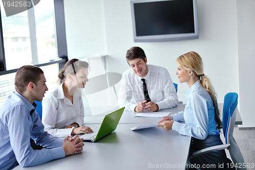 Image of business people in a meeting at office