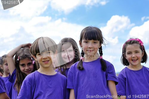 Image of happy kids group  have fun in nature