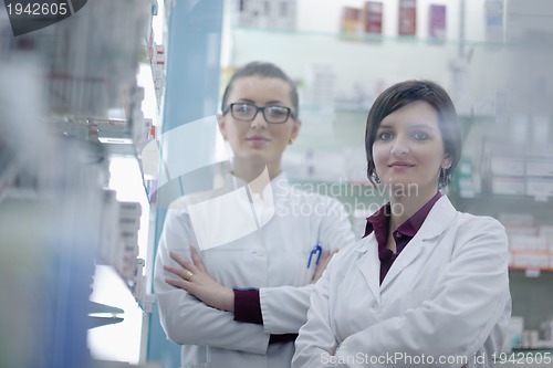 Image of team of pharmacist chemist woman  in pharmacy drugstore
