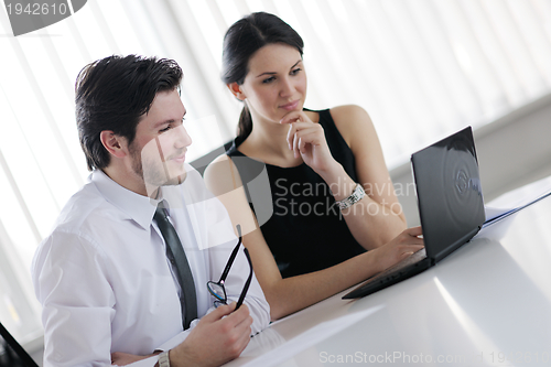 Image of business people in a meeting at office
