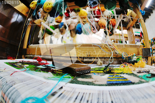 Image of traditional arabic rug production