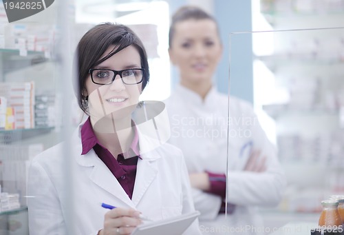 Image of team of pharmacist chemist woman  in pharmacy drugstore