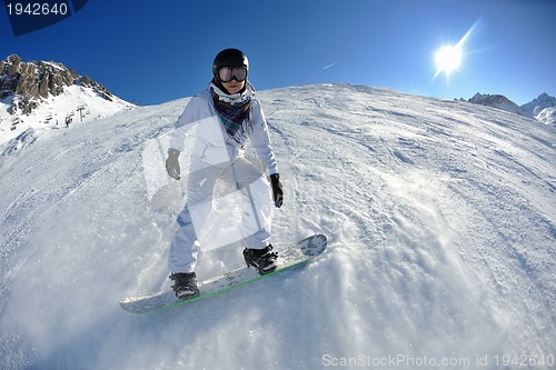 Image of skiing on fresh snow at winter season at beautiful sunny day