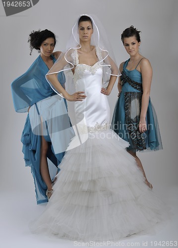 Image of portrait of a three beautiful woman in wedding dress