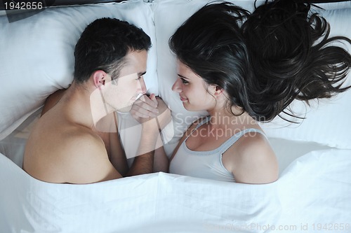 Image of young couple have good time in their bedroom