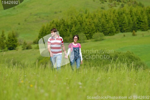 Image of romantic young couple in love together outdoor