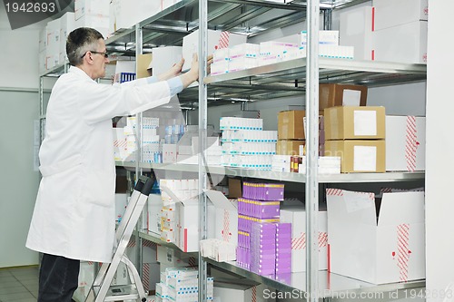 Image of medical factory  supplies storage indoor