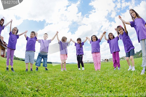 Image of happy kids group  have fun in nature