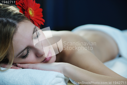 Image of Beautiful young woman in spa