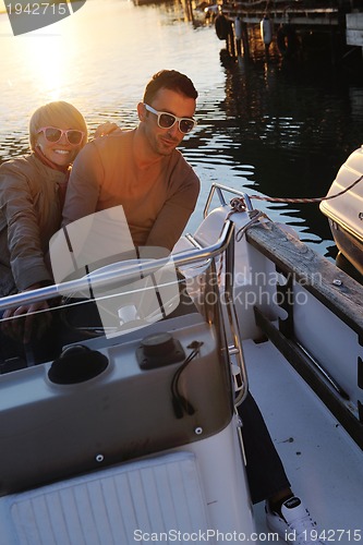 Image of couple in love  have romantic time on boat