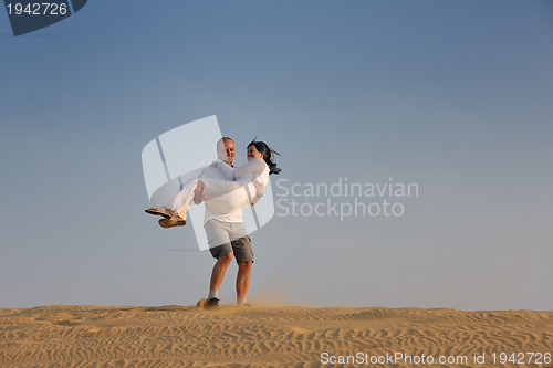 Image of couple enjoying the sunset