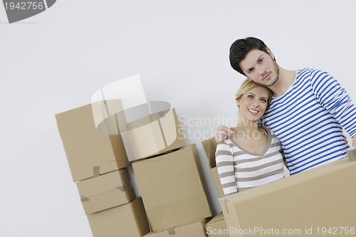 Image of Young couple moving in new home