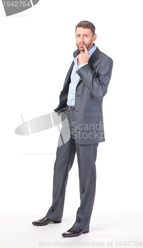 Image of Full length portrait of thoughtful business man