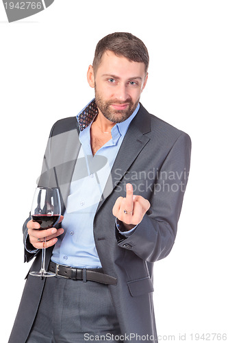 Image of Portrait of thoughtful business man with glass wine