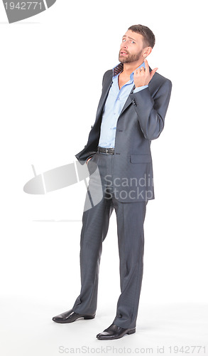 Image of Full length portrait of thoughtful business man