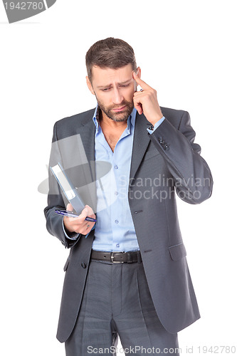 Image of Portrait of thoughtful business man with diary