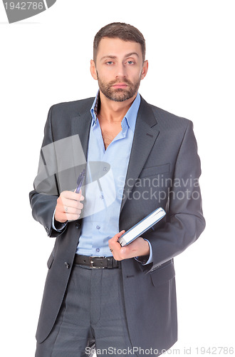 Image of Portrait of thoughtful business man with diary