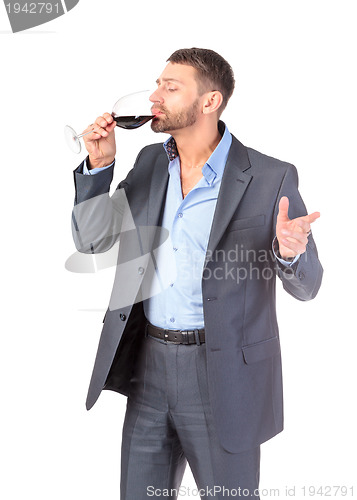 Image of Portrait business man with glass wine