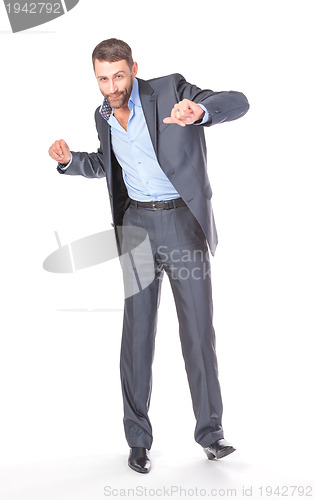 Image of Full length portrait of cheerful business man